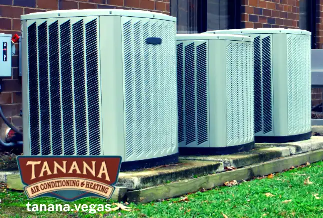 Various sizes of AC units with a Las Vegas home in background